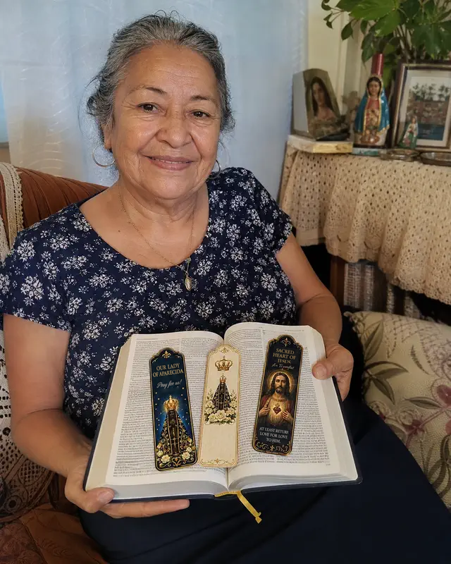 Woman using Catholic bookmarks in her Bible